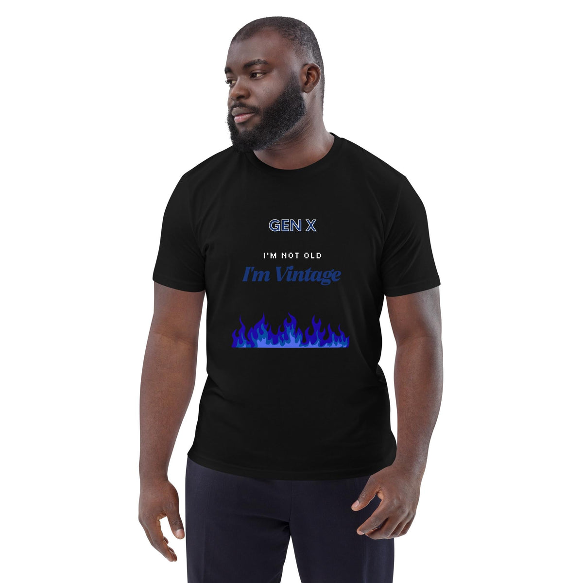 Gen X Blue Flame Vintage T-shirt in black, worn by a model with dark trousers, three-quarter view.