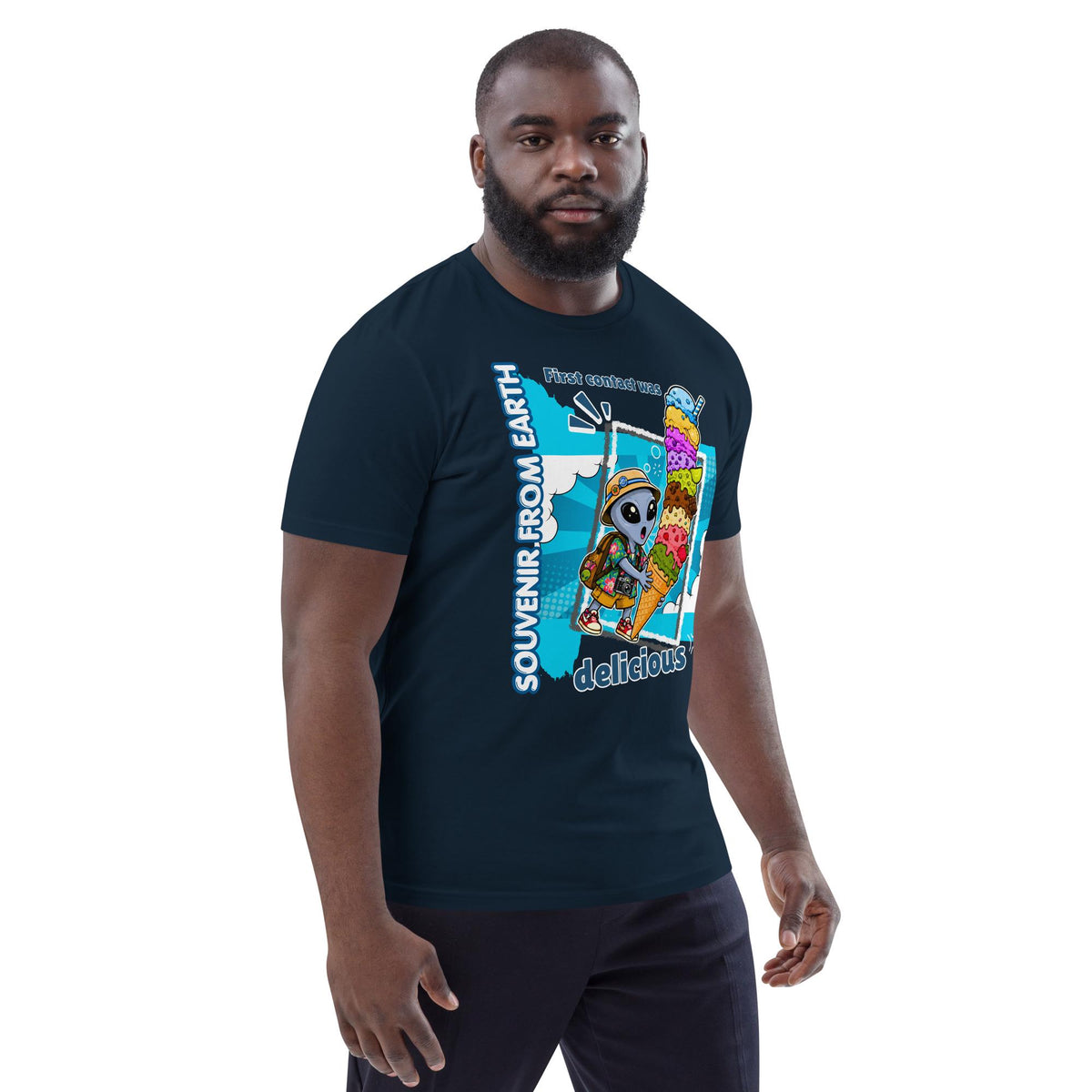 Alien Ice Cream T-shirt in navy, worn by a model with dark trousers, three-quarter view.