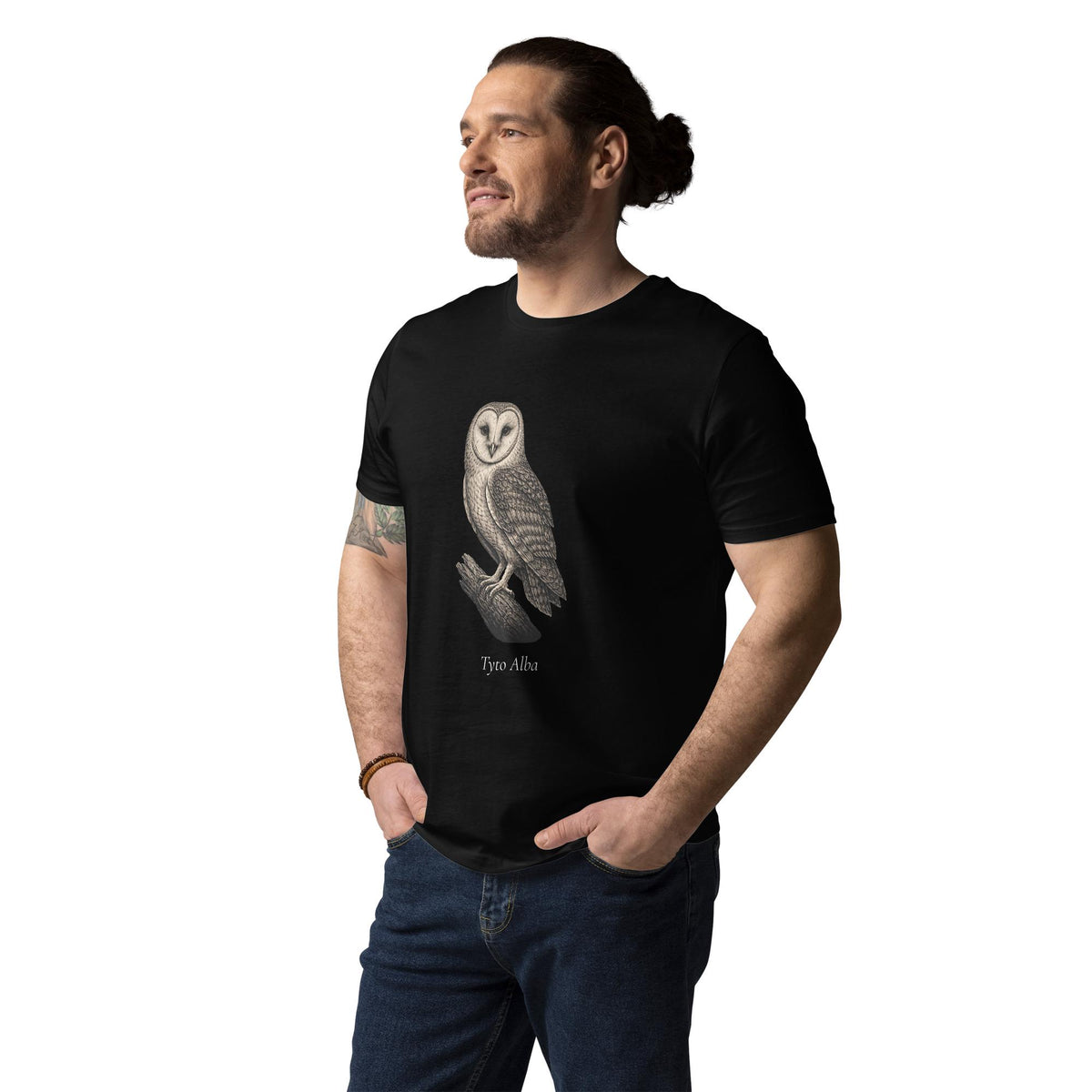 Vintage Barn Owl T-shirt in black, worn by a model with hands in pockets, three-quarter view.