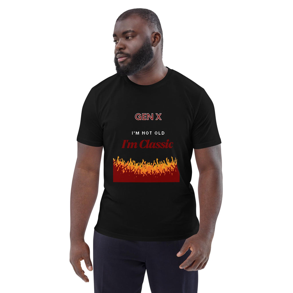Gen X Orange Flame Classic T-shirt in black, worn by a model with dark trousers, three-quarter view.