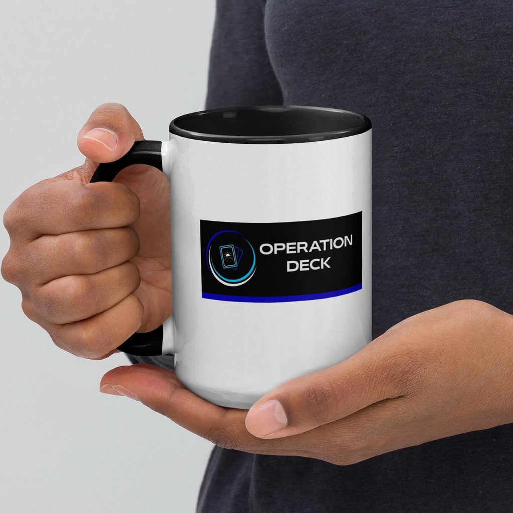 Operation Deck Désagréable mug tall mug logo side held by the black handle.