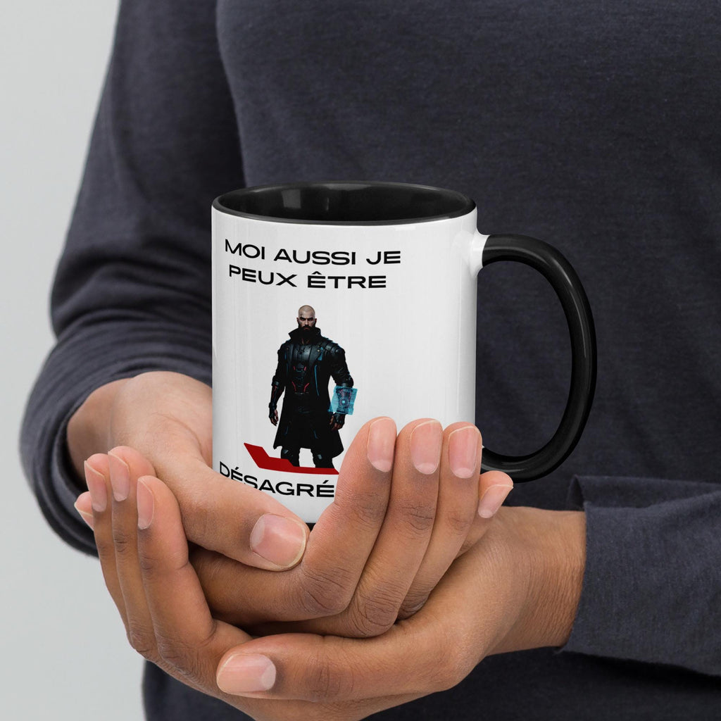 Operation Deck Désagréable mug character and quote side cradled in hands against a dark top.