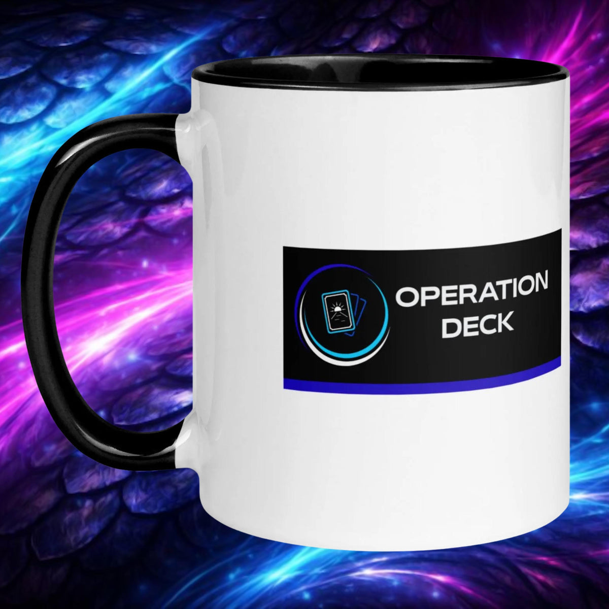 Operation Deck Désagréable mug with black handle and interior, logo side against a cosmic backdrop.