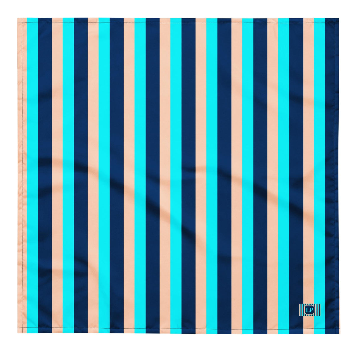 Blue Stripe bandana laid flat, showing vertical navy, turquoise and sand stripes.