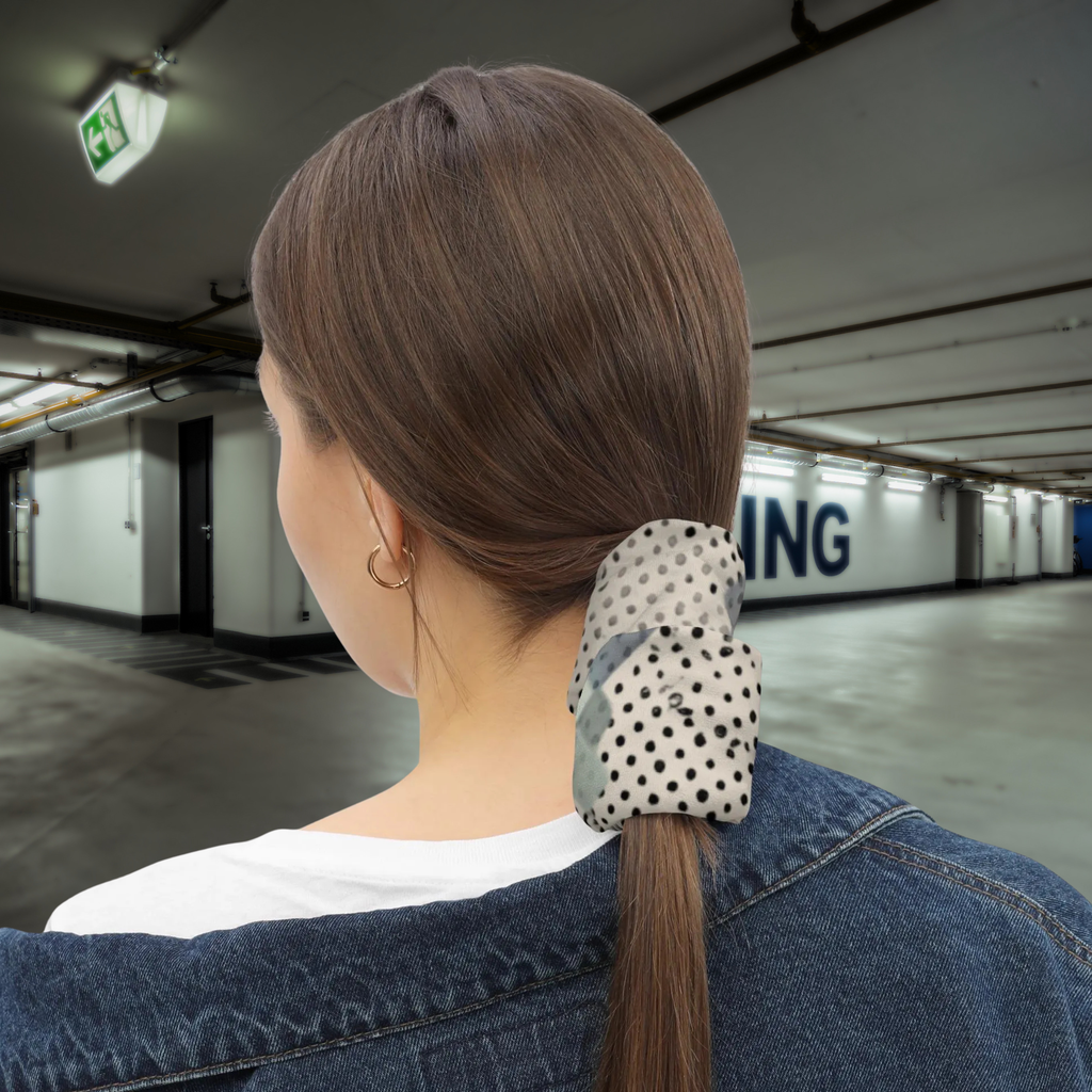 Urban Concrete 9 neck gaiter used as a ponytail wrap in a car park, rear view.