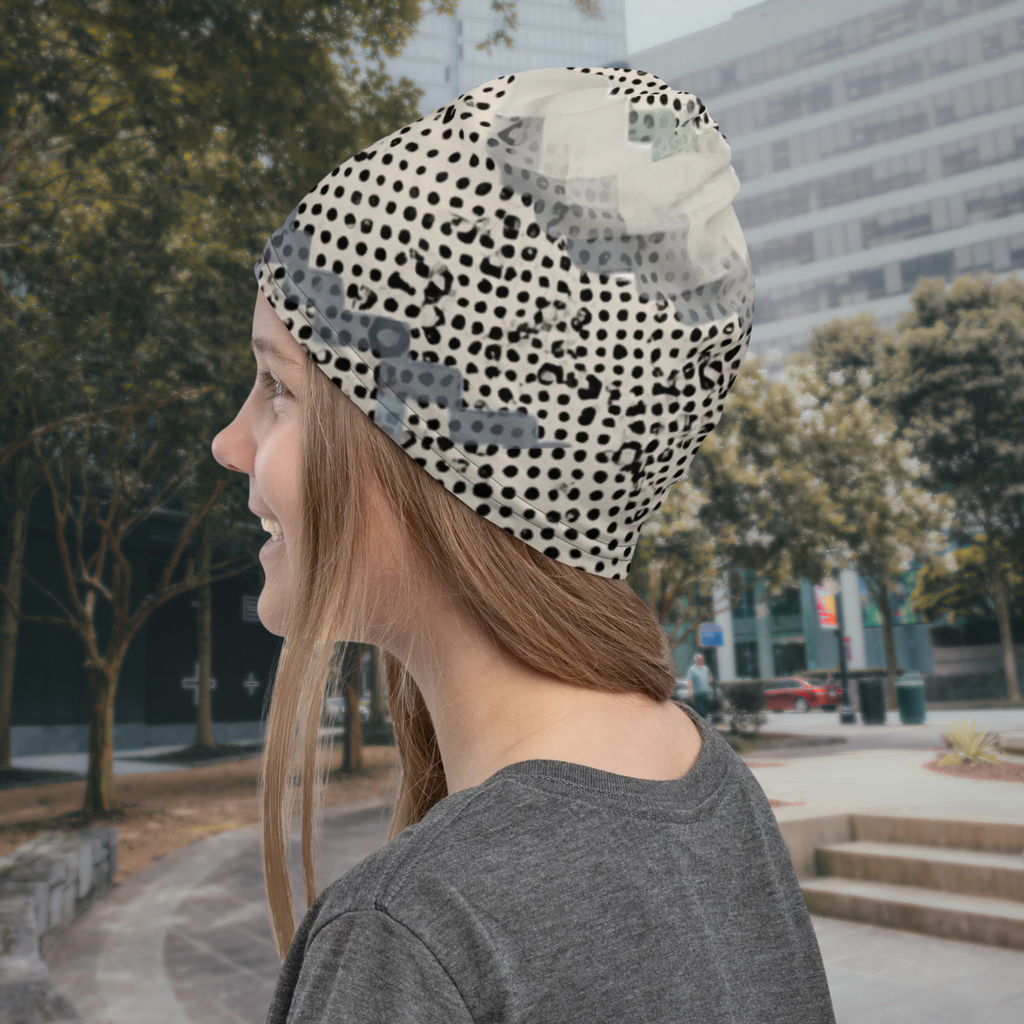 Urban Concrete 9 neck gaiter worn as a beanie on a city street, side view.