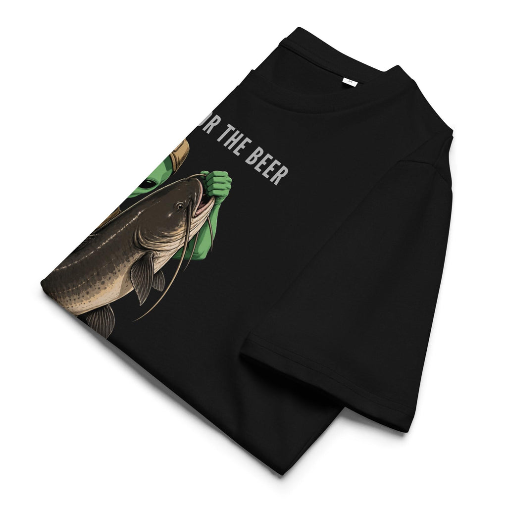 Alien Catfish fishing T-shirt in black, folded on white to show the catfish illustration.