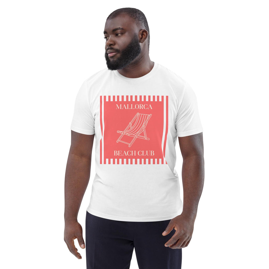 Mallorca Beach Club T-shirt in white, worn by a model with dark trousers, three-quarter view.
