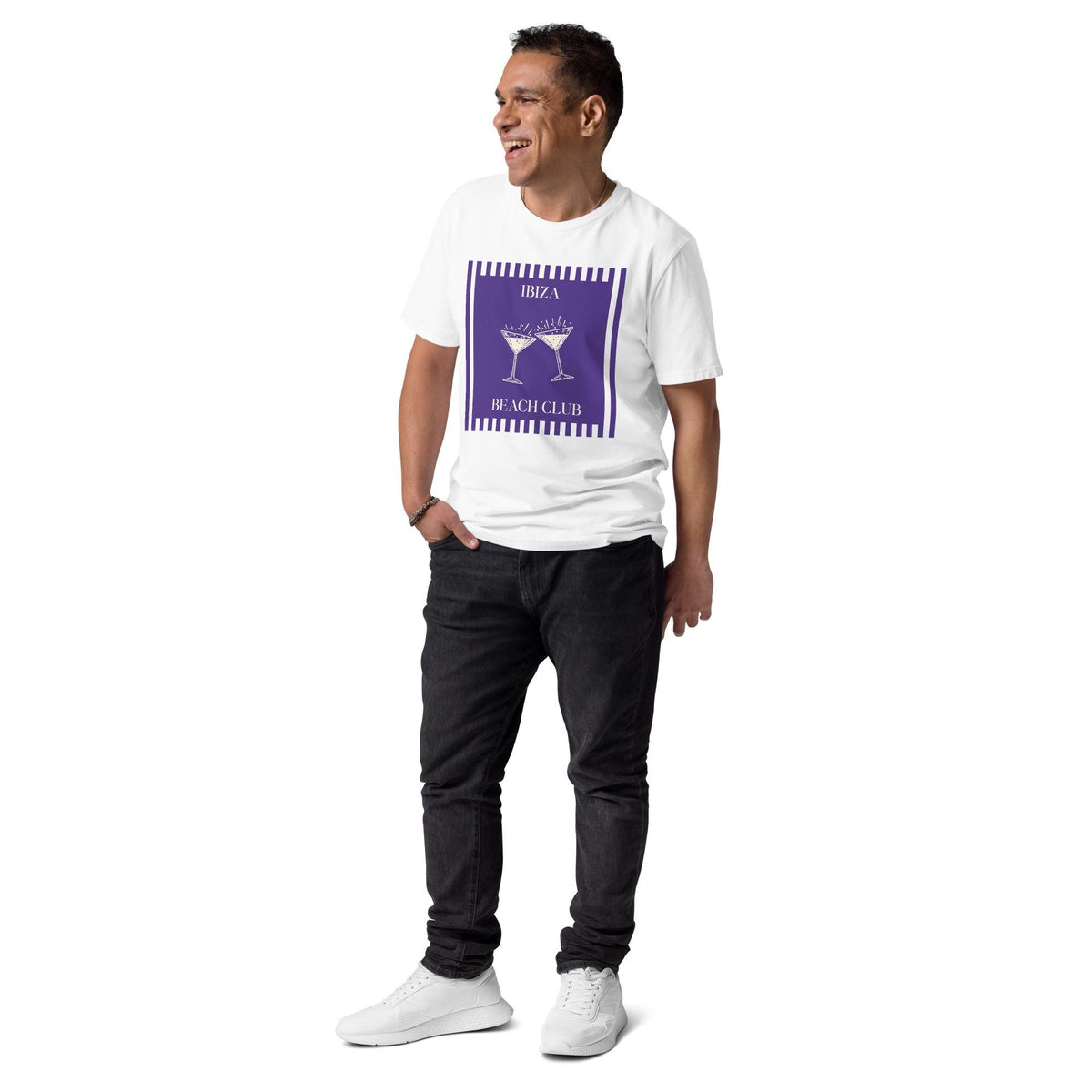 Ibiza Beach Club T-shirt in white, full-length view on a model with hands in pockets.