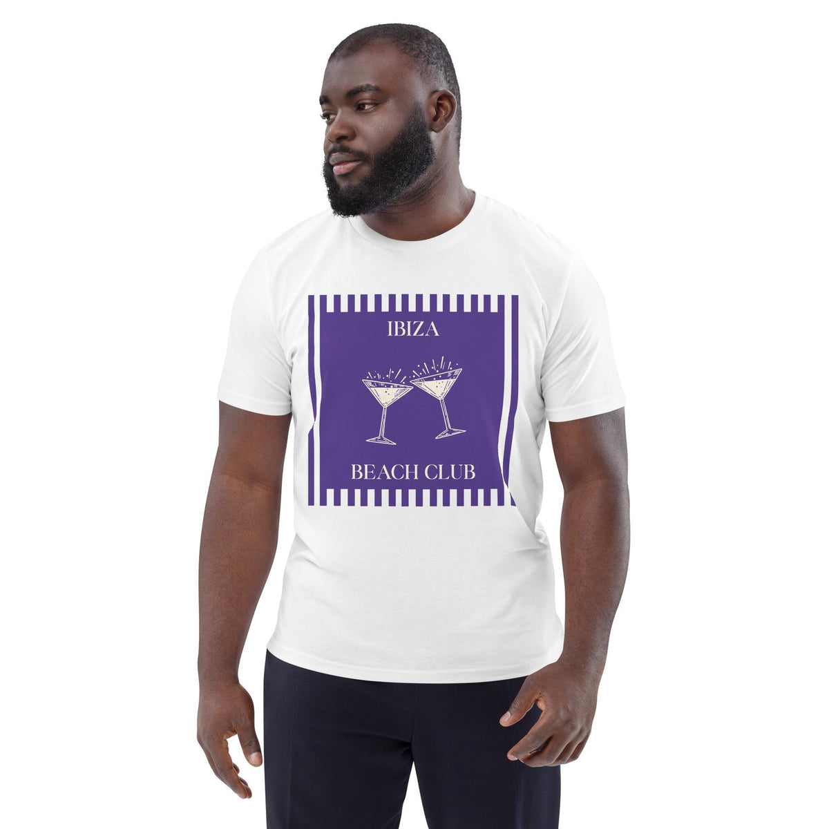 Ibiza Beach Club T-shirt in white, worn by a model with dark trousers, three-quarter view.