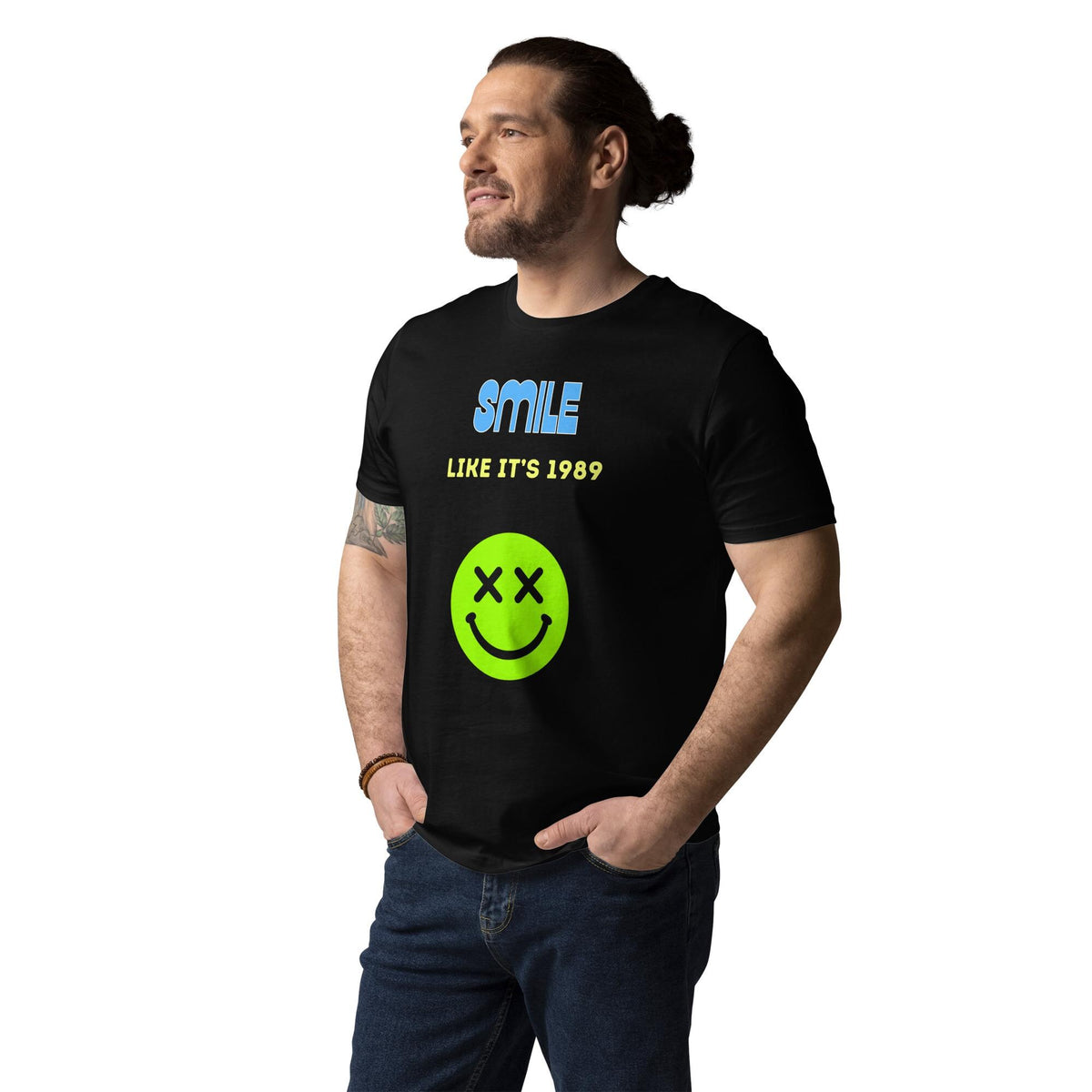 Smile Like It's 1989 rave T-shirt in black, worn by a model with hands in pockets, three-quarter view.