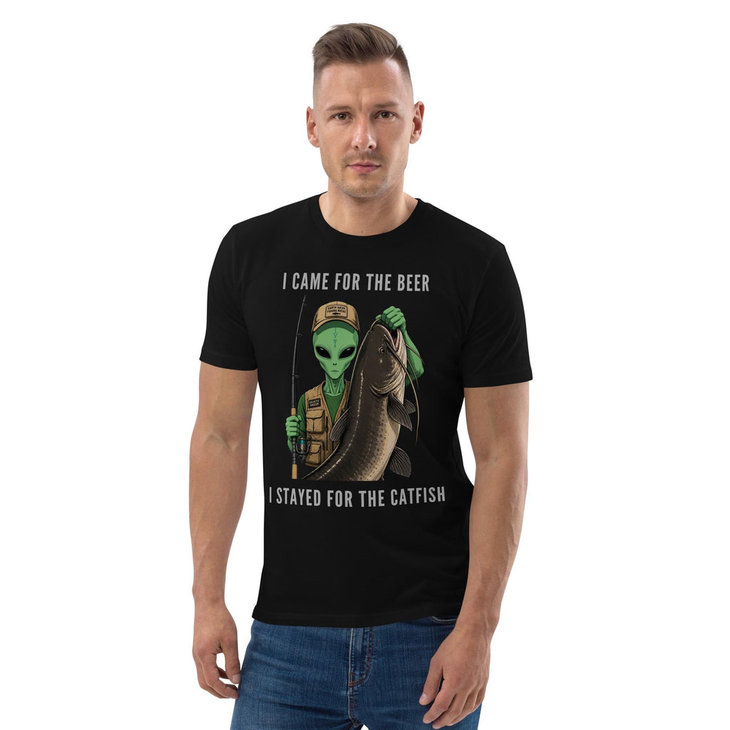Alien Catfish fishing T-shirt in black, worn by a model with jeans, front view.