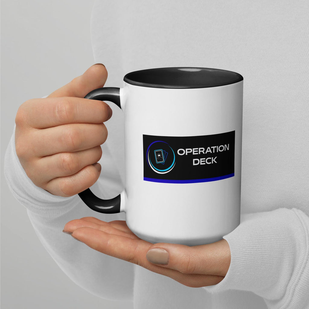 Operation Deck Désagréable mug tall mug logo side held in both hands.