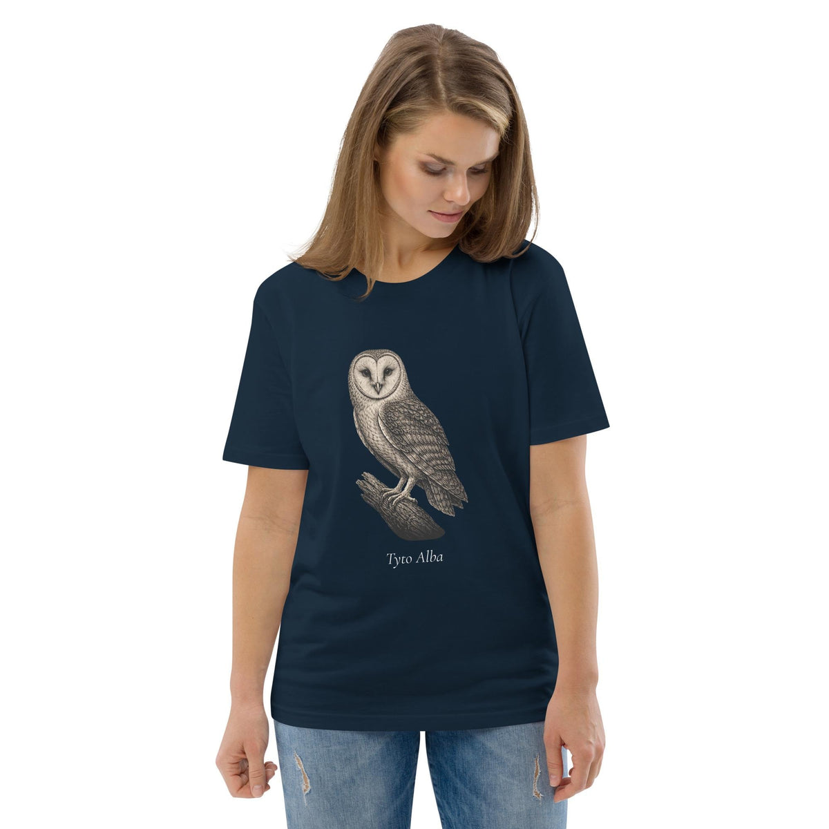 Vintage Barn Owl T-shirt in navy, worn by a model looking down at the owl illustration on white.