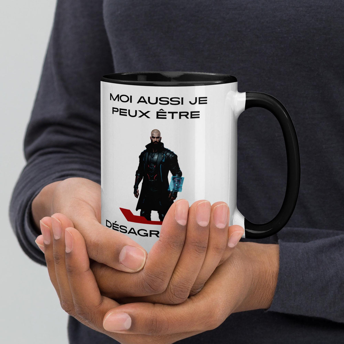 Operation Deck Désagréable mug tall mug character and quote side cradled in hands.