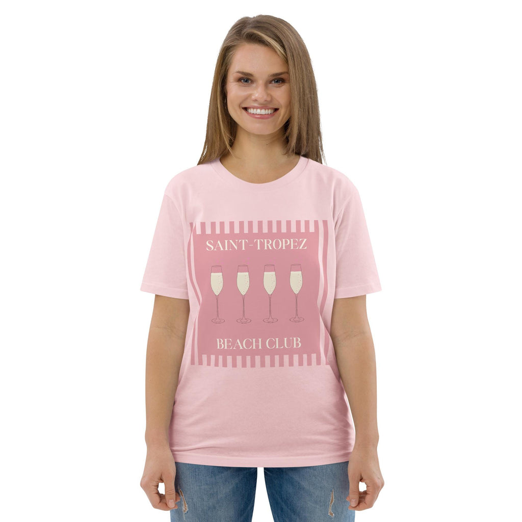 Saint-Tropez Beach Club T-shirt in pink, worn by a model with blue jeans, front view.
