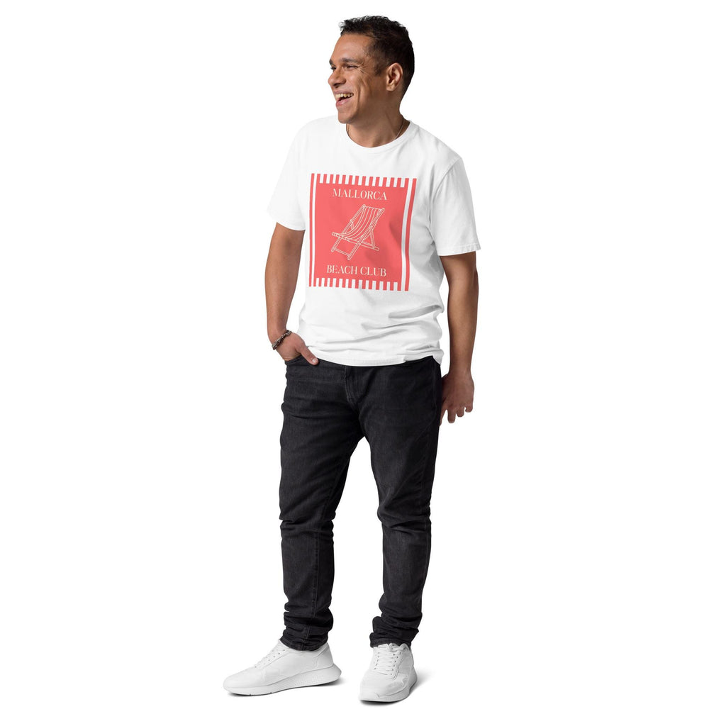 Mallorca Beach Club T-shirt in white, full-length view on a model with hands in pockets.