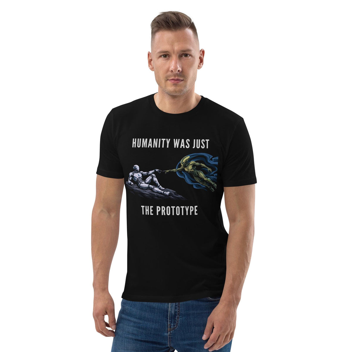 Humanity Prototype AI alien T-shirt in black, worn by a model with hands in pockets, front view.