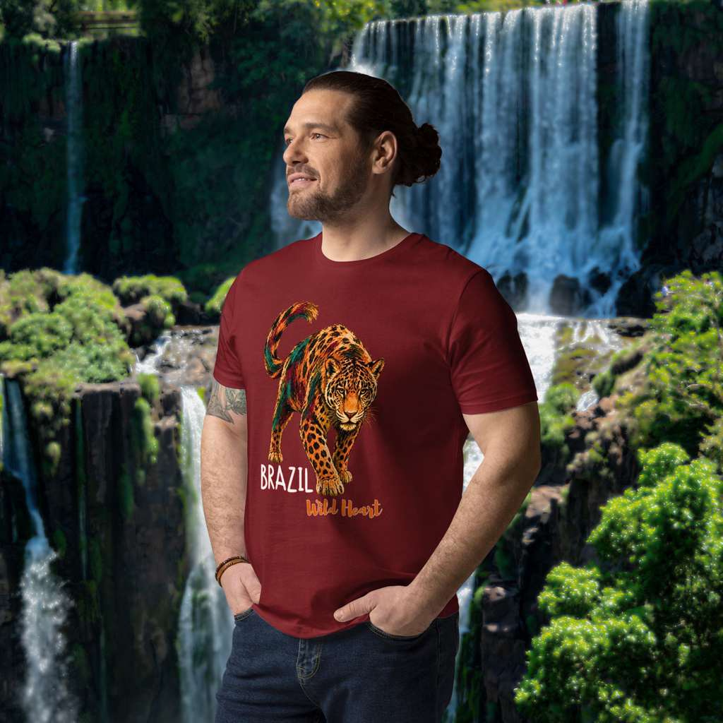 Brazil Jaguar T-shirt in burgundy, worn by a model beside a waterfall.