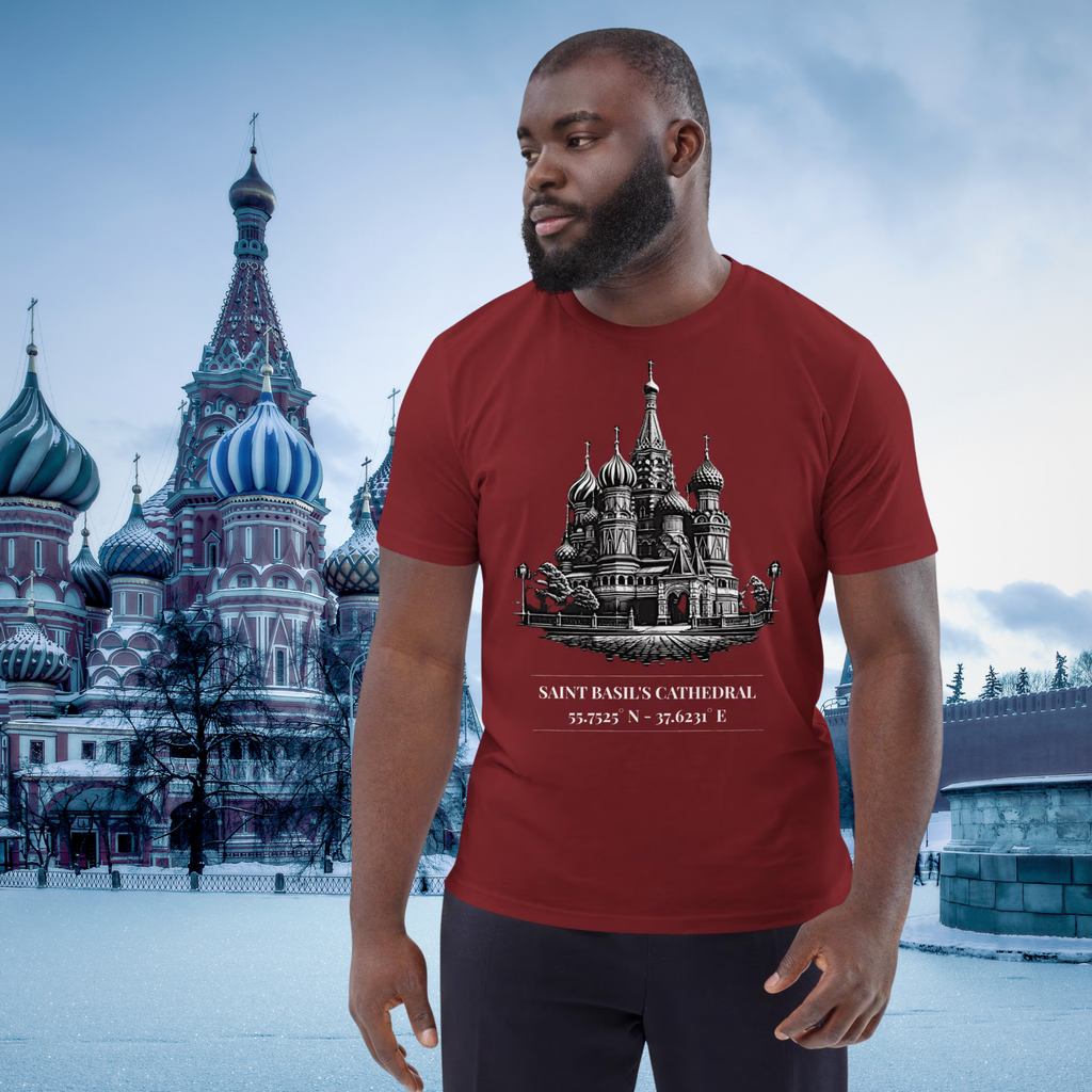 Saint Basil's Cathedral coordinates T-shirt in burgundy, worn by a model in a snowy cathedral setting.