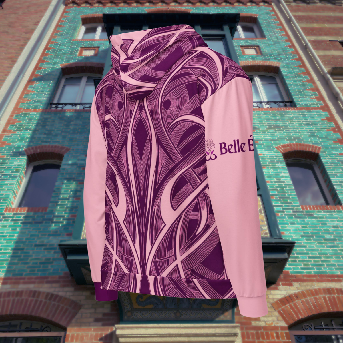 Pink Art Nouveau zip hoodie rear three-quarter product view showing the patterned body and pink sleeve.