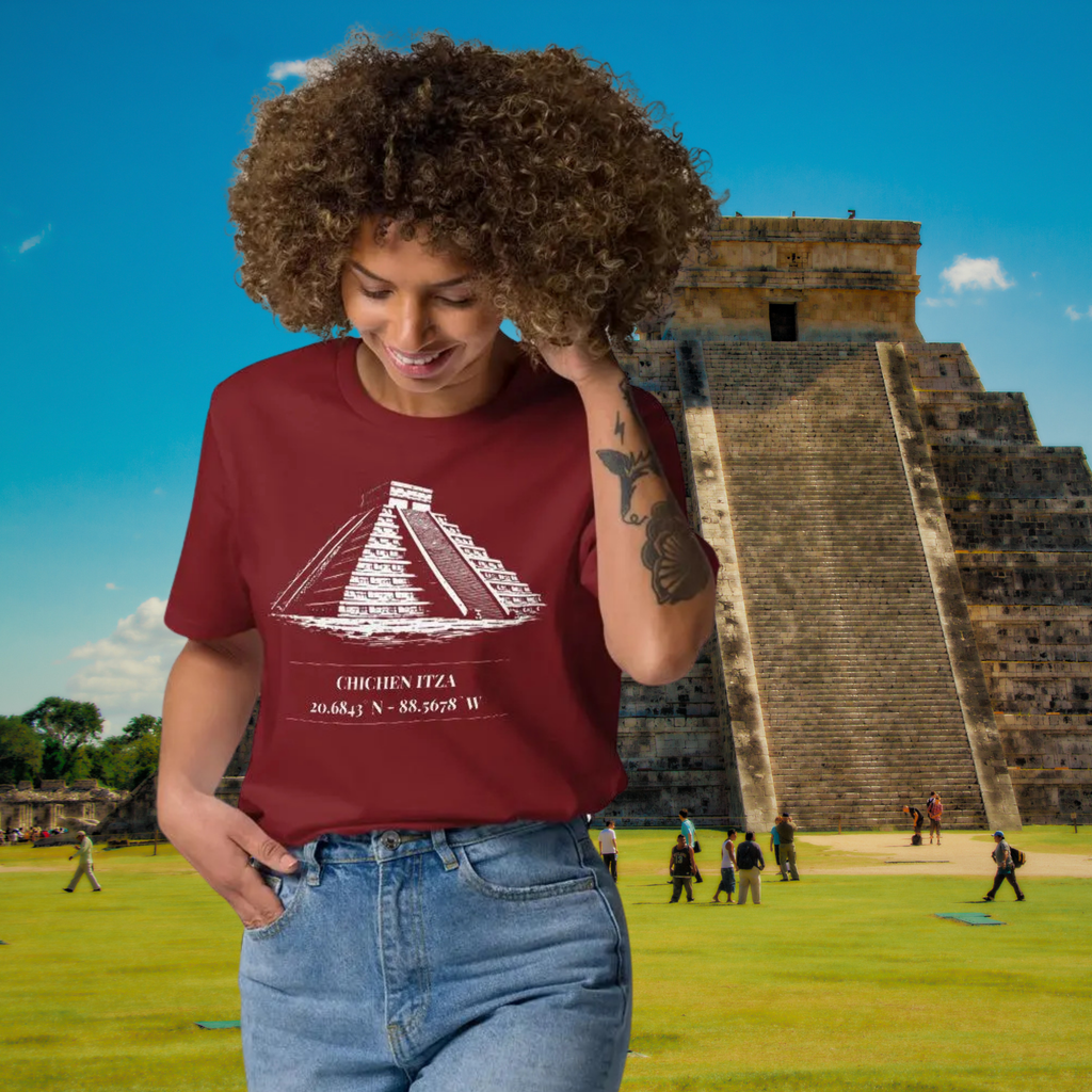 Chichen Itza coordinates T-shirt in burgundy, worn by a model looking down at the pyramid graphic.