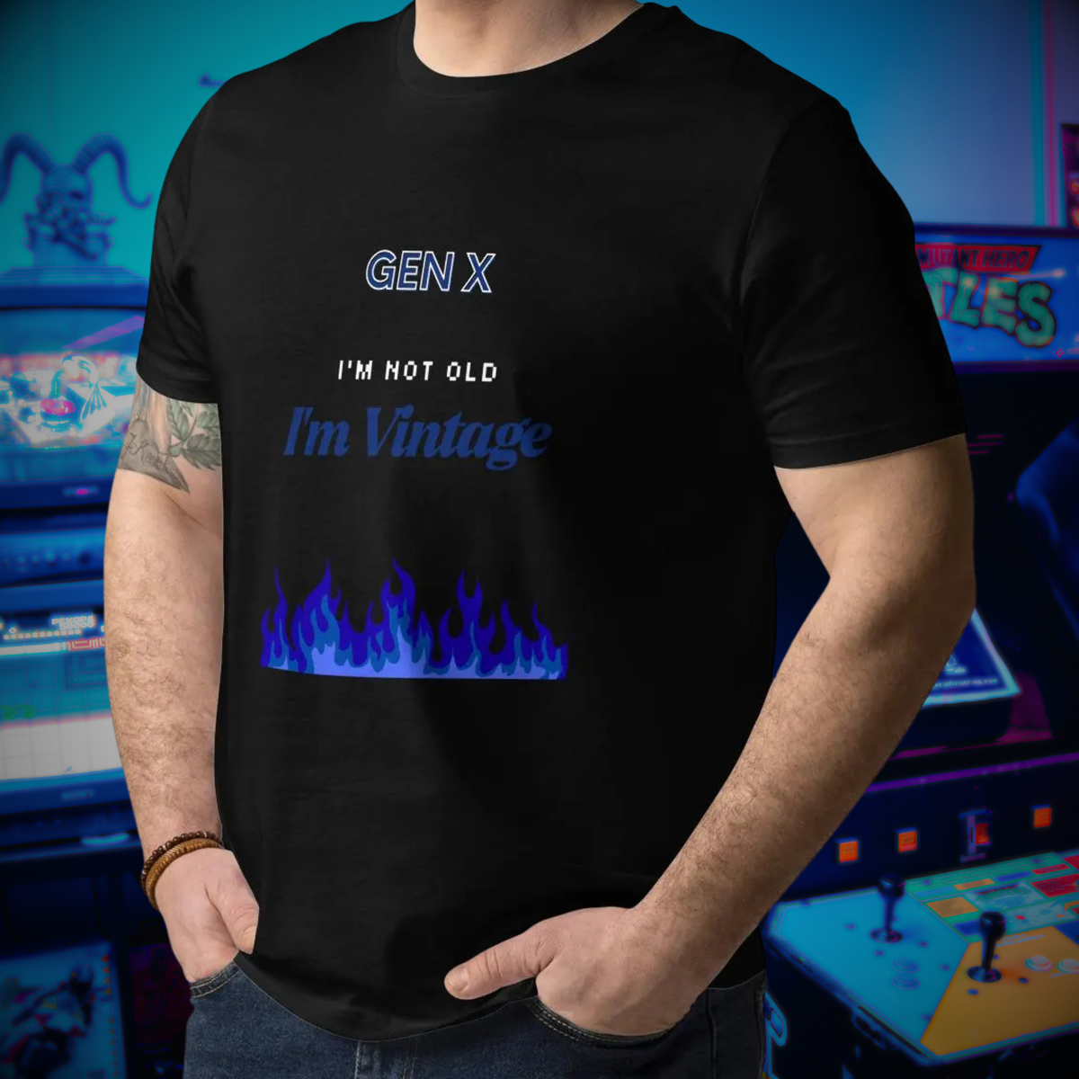 Gen X Blue Flame Vintage T-shirt in black, torso view against arcade machines.