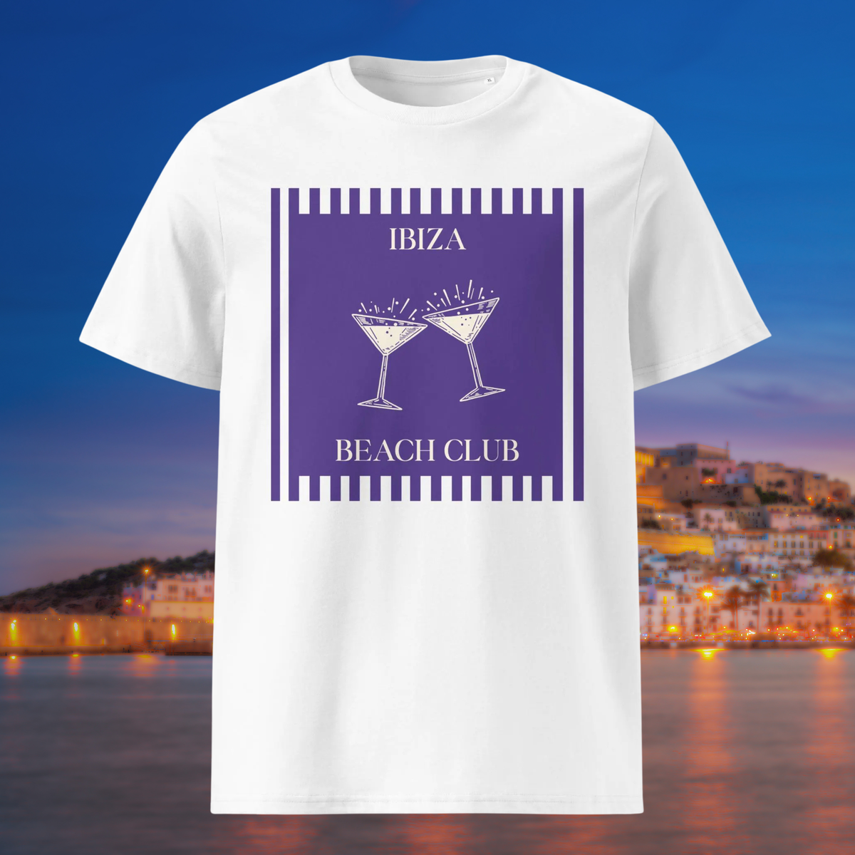Ibiza Beach Club T-shirt in white, front product view against a harbour at dusk.