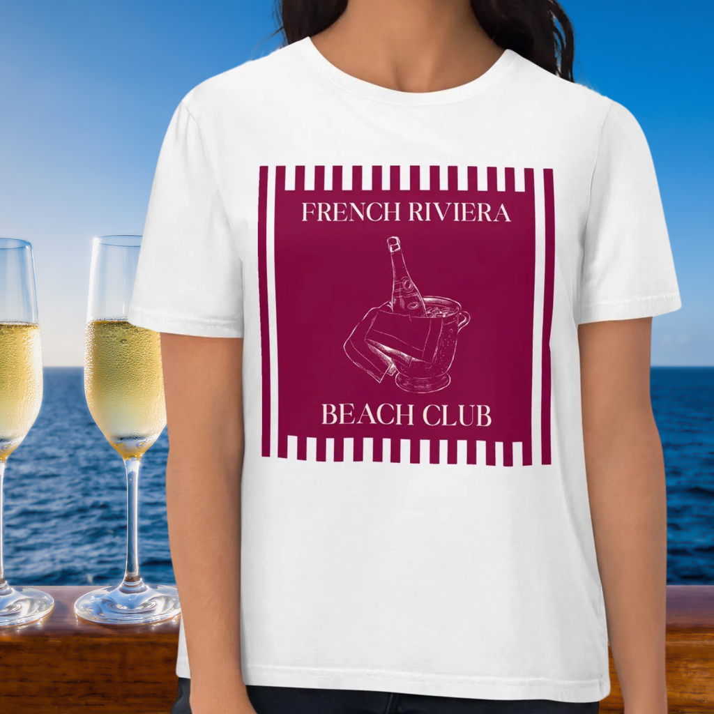 French Riviera Beach Club T-shirt in white, torso view showing the wine-colored graphic beside champagne glasses.