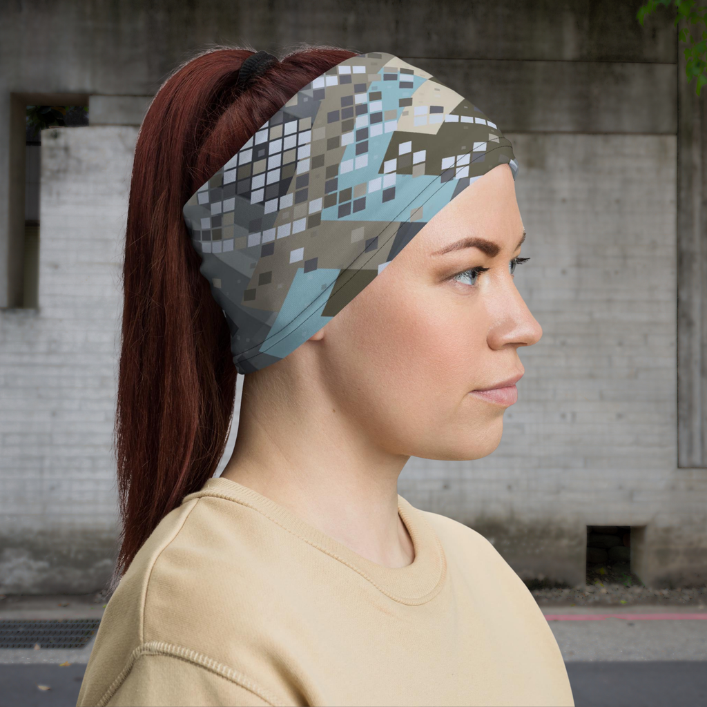 Urban Concrete 2 neck gaiter worn as a headband on a city street, side view.