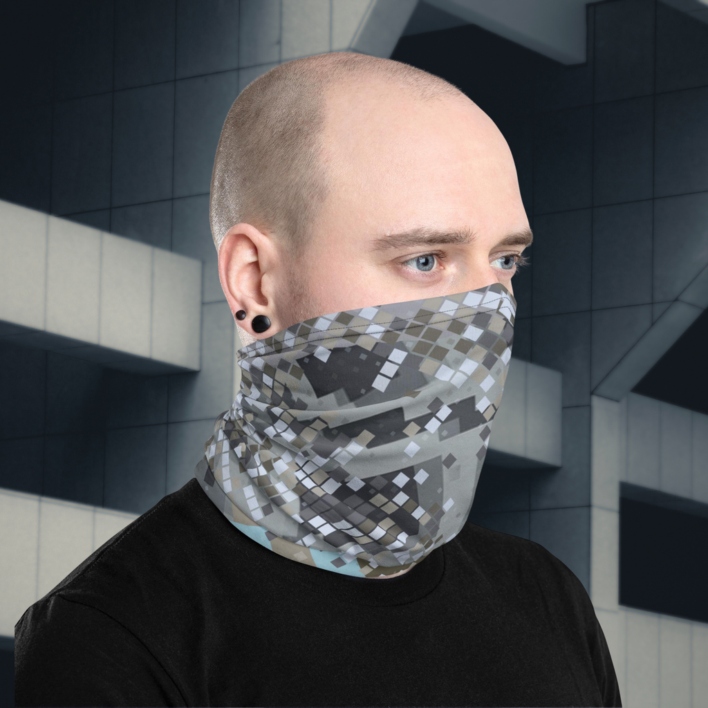 Urban Concrete 2 neck gaiter worn as a face covering beside a concrete building.