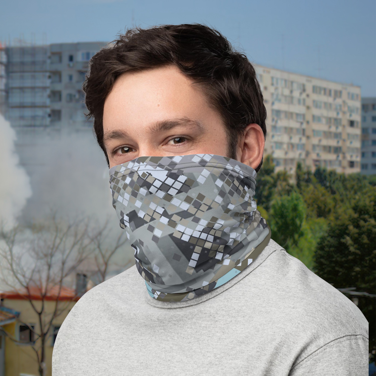 Urban Concrete 2 neck gaiter worn as a face covering outside apartment buildings.