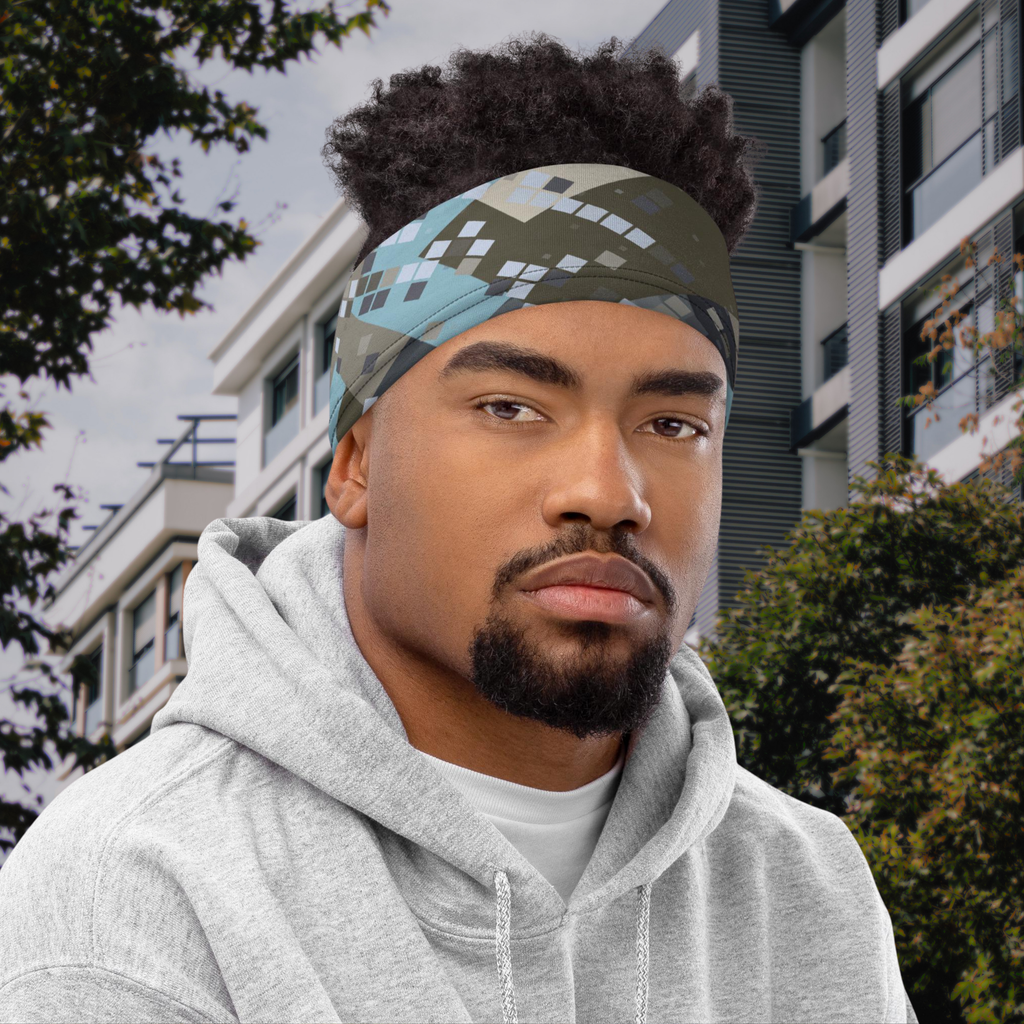 Urban Concrete 2 neck gaiter worn as a headband on a city street with a grey hoodie.