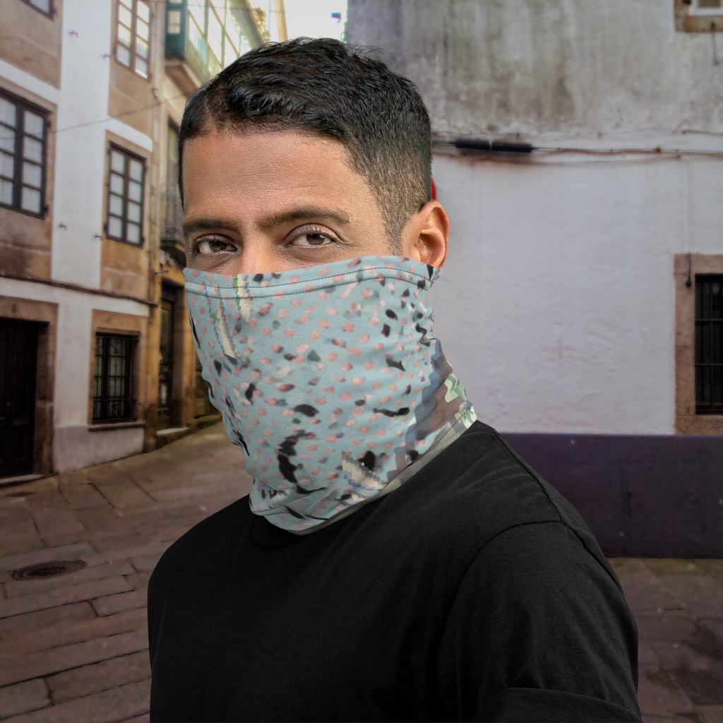 Urban Concrete 3 neck gaiter worn as a face covering in an alley, three-quarter view.
