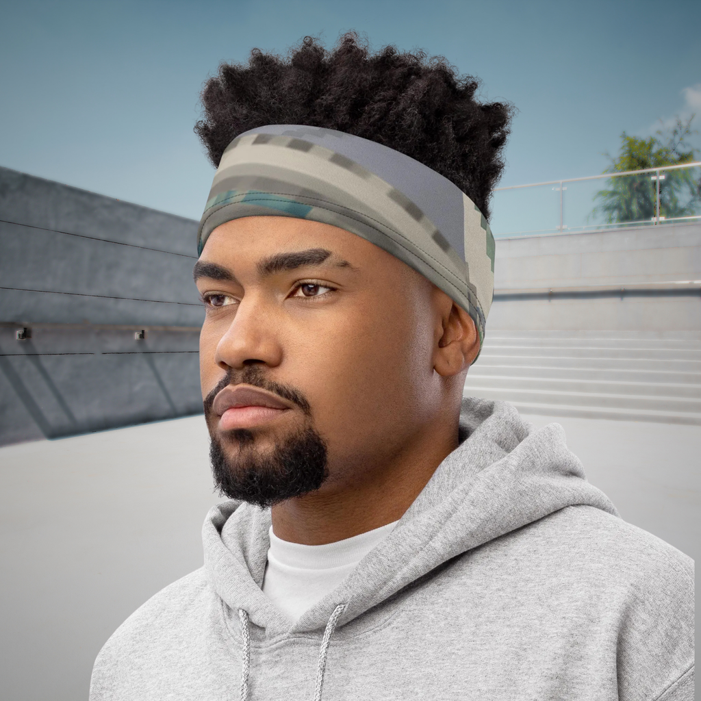 Urban Concrete 3 neck gaiter worn as a headband at a skatepark with a grey hoodie.