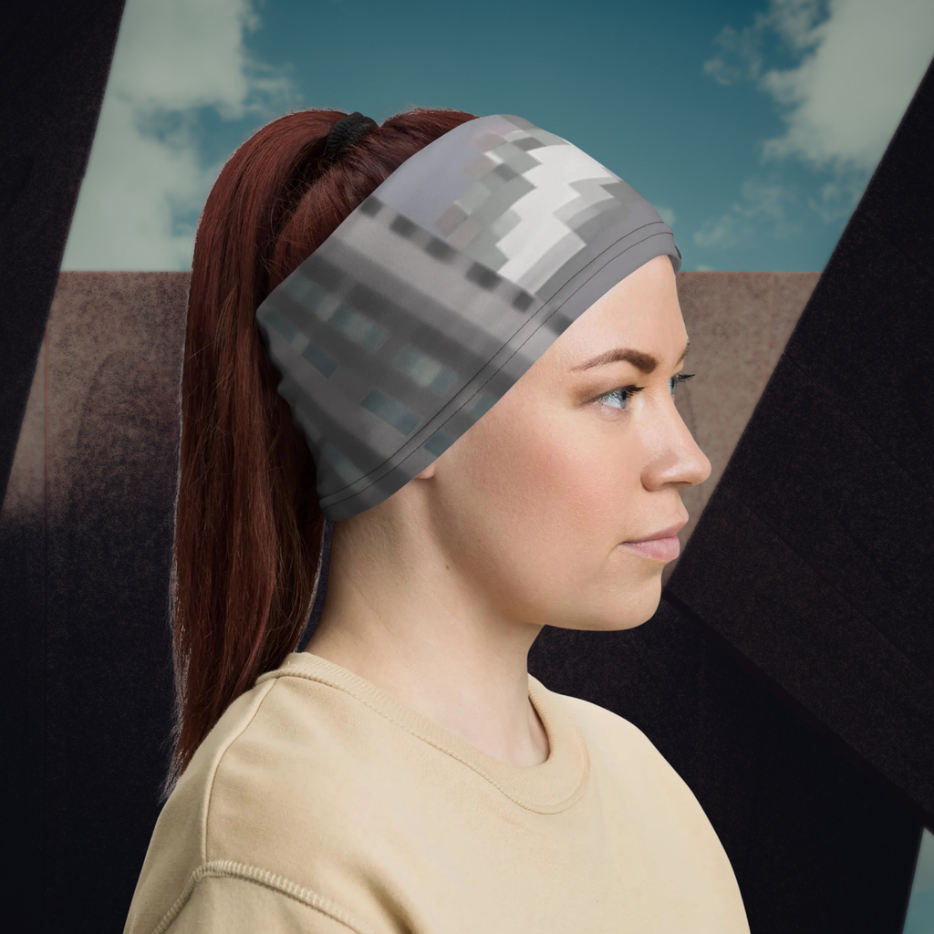 Urban Concrete 4 neck gaiter worn as a headband at a skatepark, side view.