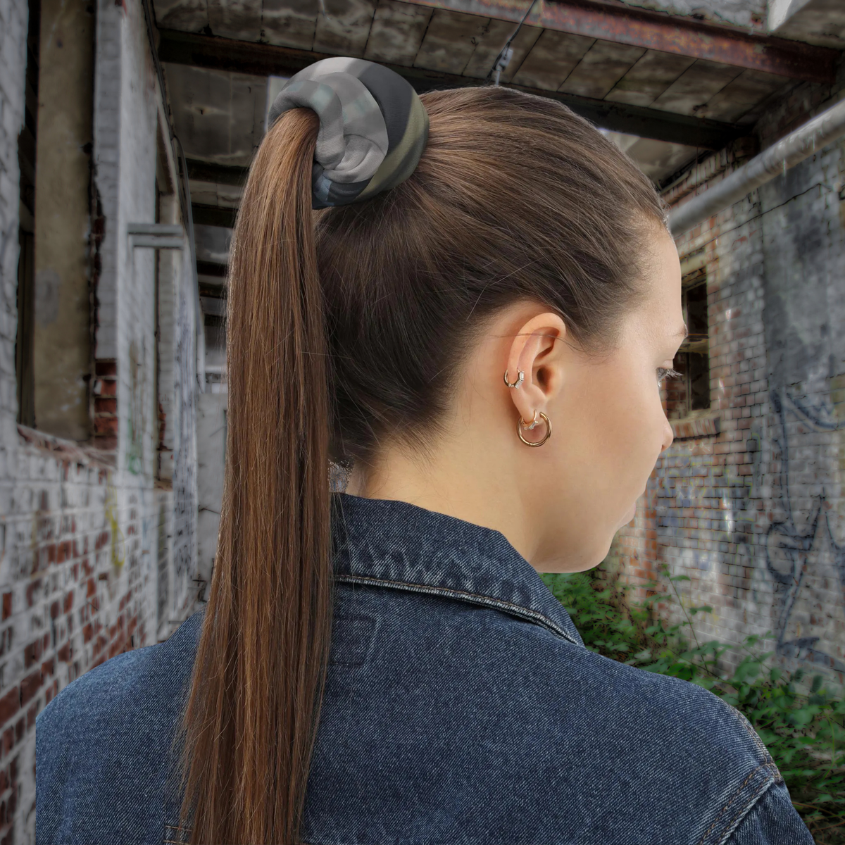 Urban Concrete 4 neck gaiter used to secure a high ponytail, rear side view.