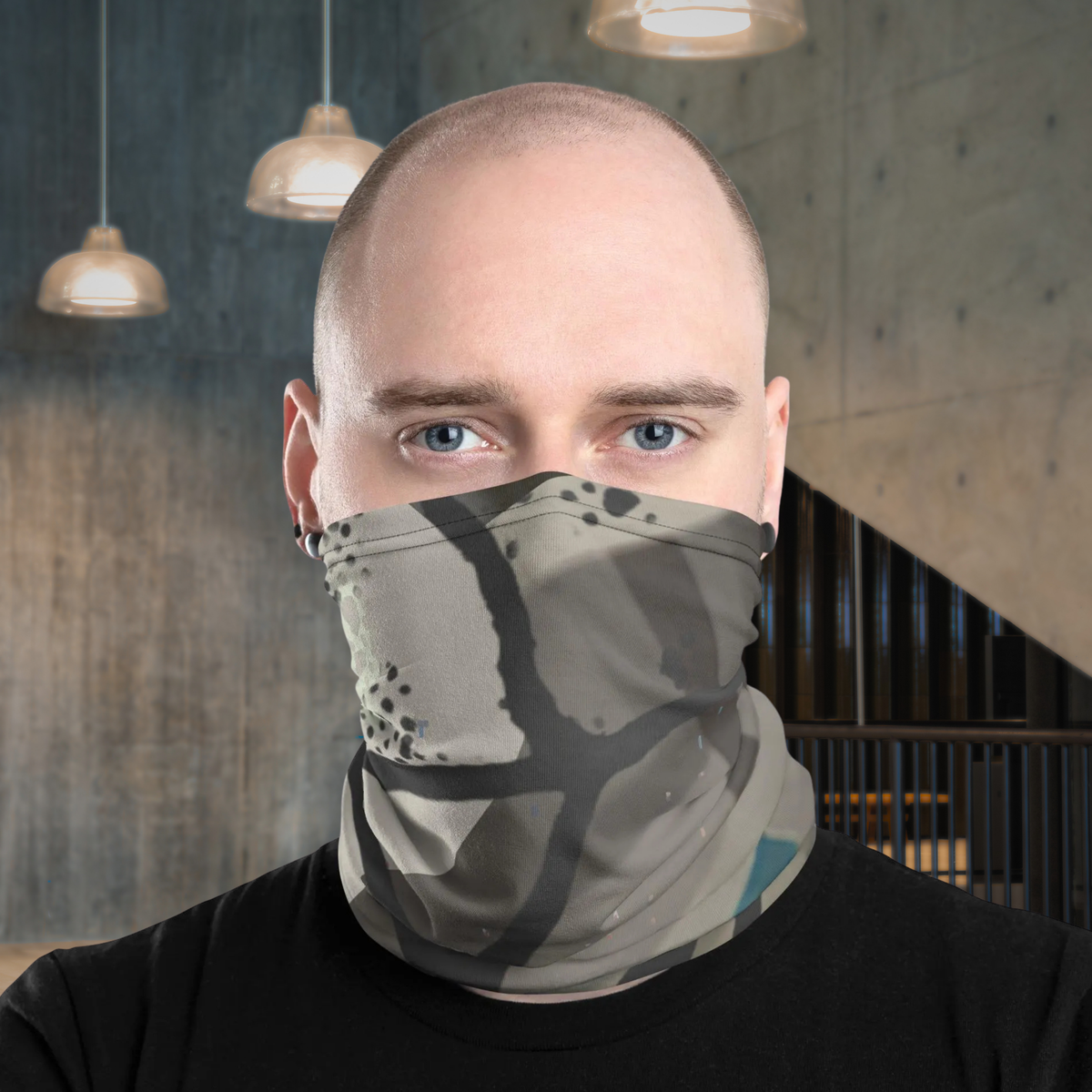 Urban Concrete 5 neck gaiter worn as a face covering indoors with a black T-shirt.