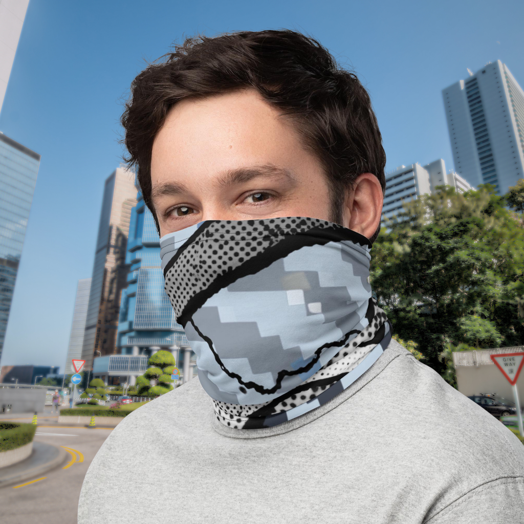 Urban Concrete 6 neck gaiter worn over the nose and mouth outside modern buildings.