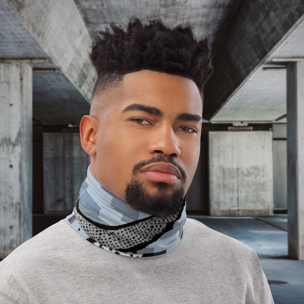 Urban Concrete 6 neck gaiter worn as a neck warmer with a grey T-shirt.