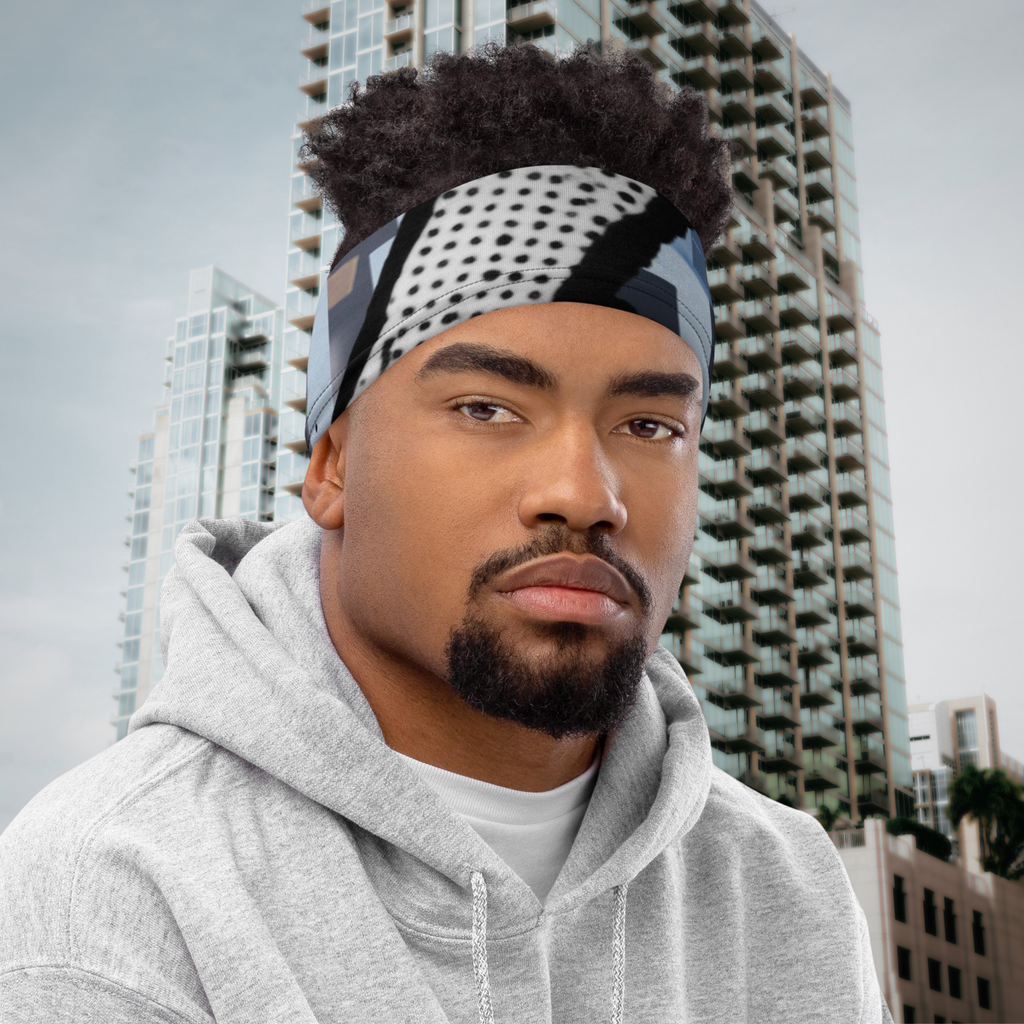 Urban Concrete 6 neck gaiter worn as a headband with a grey hoodie.