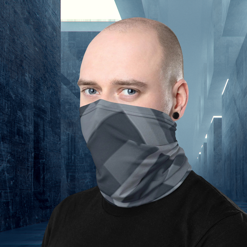Urban Concrete 8 neck gaiter worn as a face covering in a blue-grey alley.