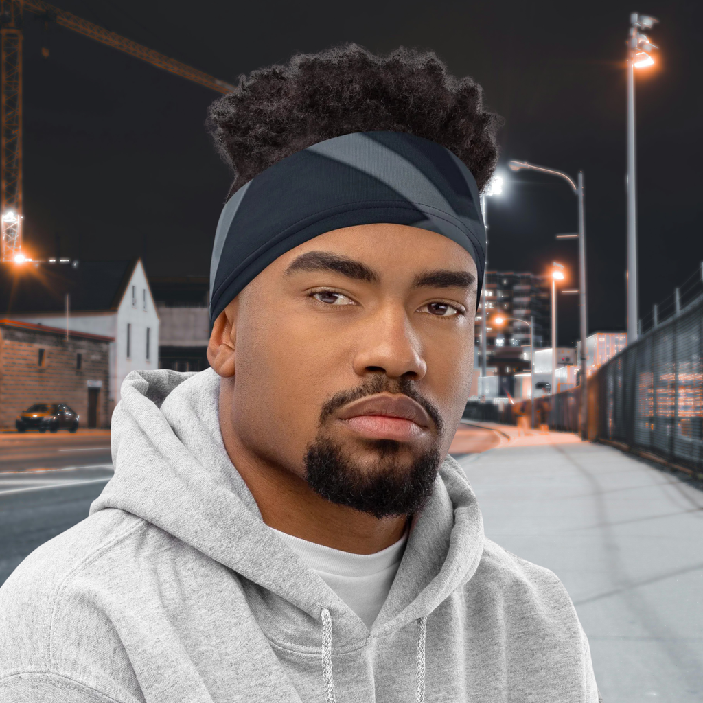 Urban Concrete 8 neck gaiter worn as a headband with a grey hoodie.