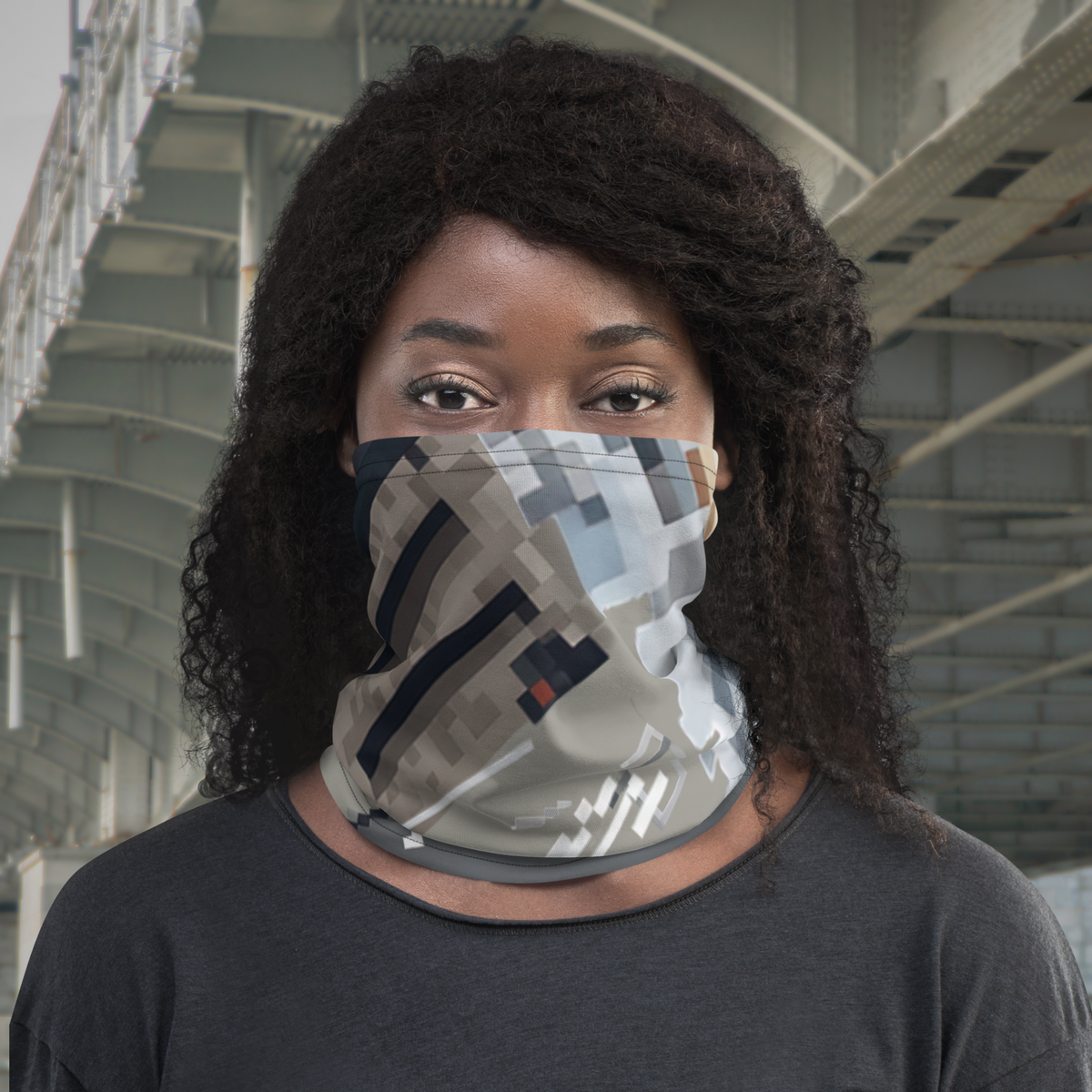 Urban Concrete 10 neck gaiter worn over the nose and mouth, front view with a dark T-shirt.