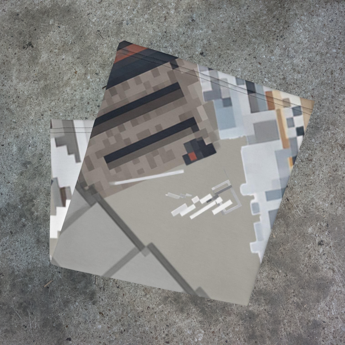 Urban Concrete 10 neck gaiter folded to show grey, cream and muted blue geometric blocks.