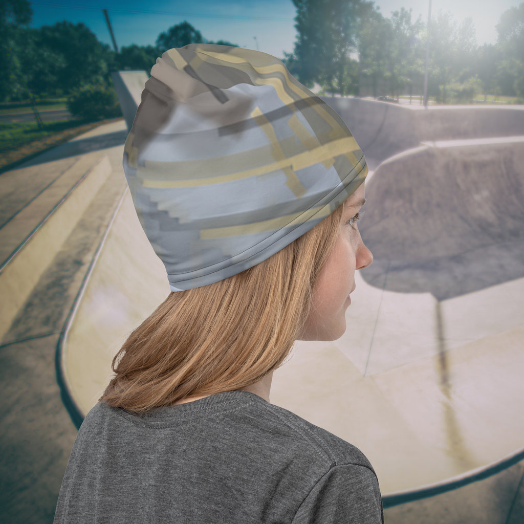 Urban Concrete 7 neck gaiter worn as a beanie at a skatepark, rear side view.