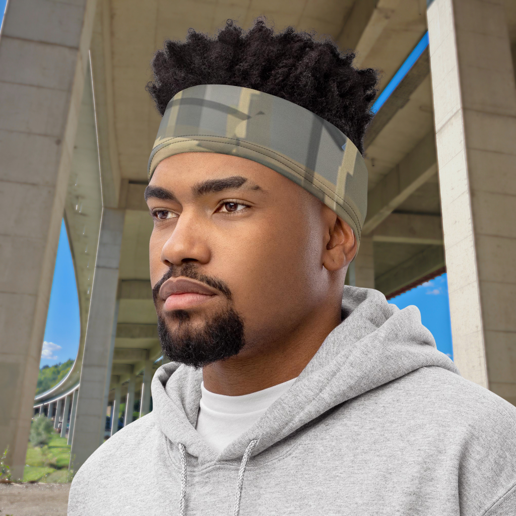 Urban Concrete 7 neck gaiter worn as a headband with a grey hoodie.