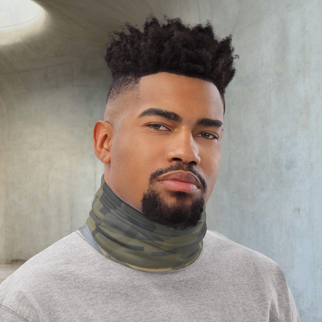 Urban Concrete 7 neck gaiter worn as a neck warmer against a concrete wall.