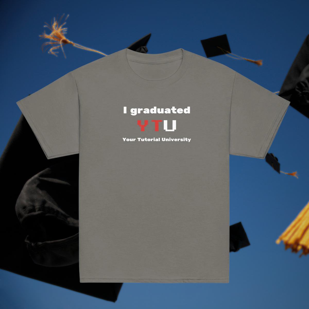 I Graduated YTU kids' T-shirt in charcoal, front product view against graduation caps.