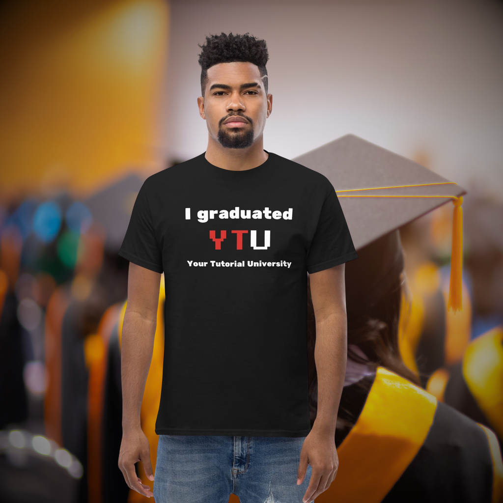 I Graduated YTU T-shirt in black, worn by a model against a blurred graduation backdrop.